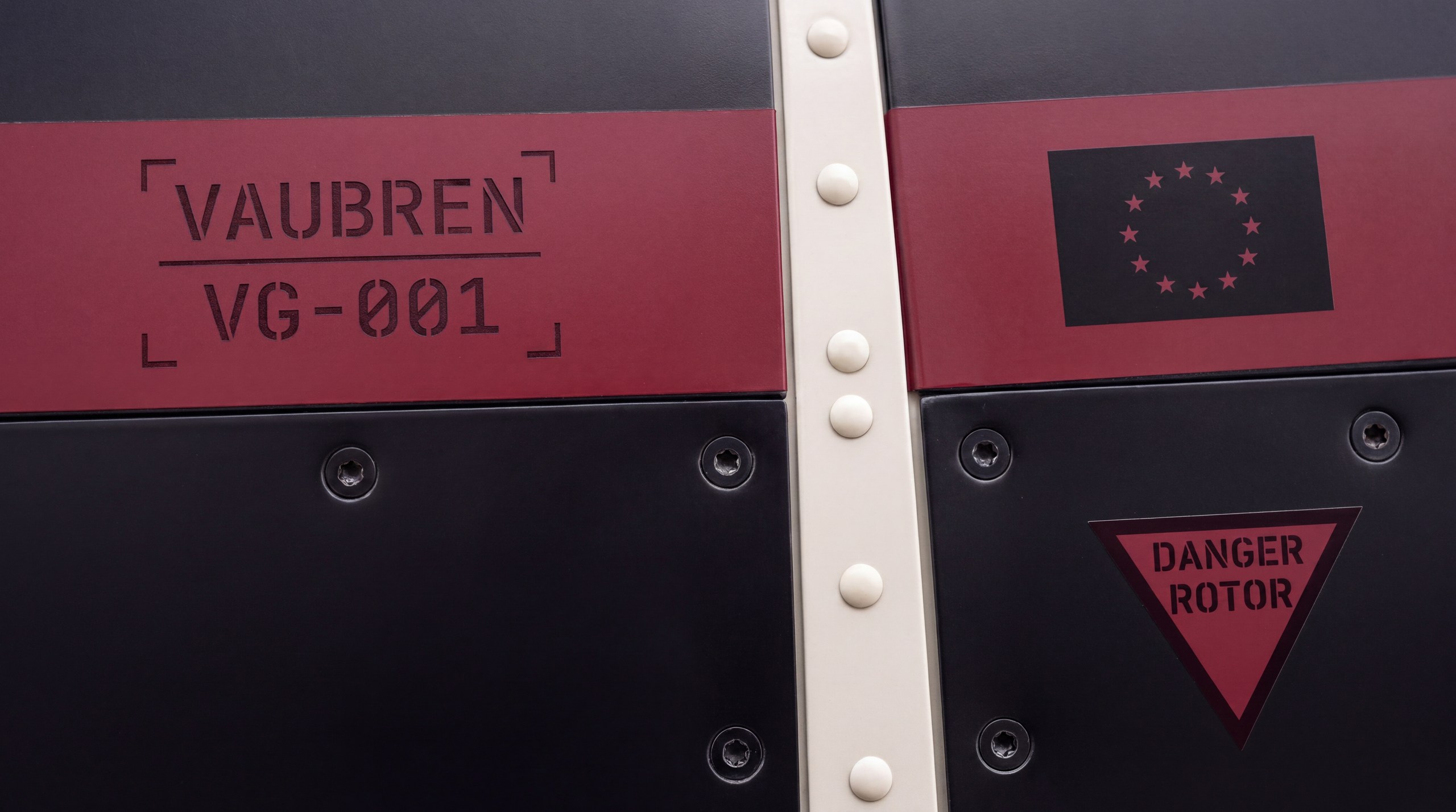 Vaubren fuselage placard: serial VG-001 and EU flag on a burgundy band