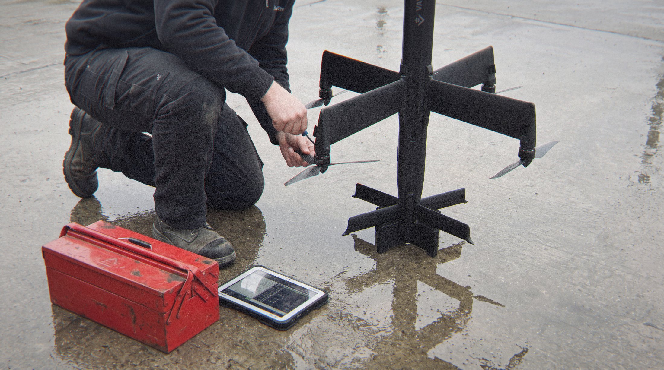 A technician checking a Vanguard rotor on the apron